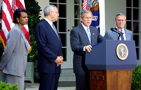 U.S. President George W. Bush (at podium) in the White House Rose Garden on June 24, 2002.