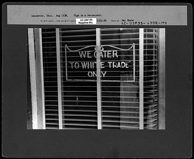 Sign on restaurant indicating "We Cater to White Trade Only," Lancaster, Ohio, 1938.