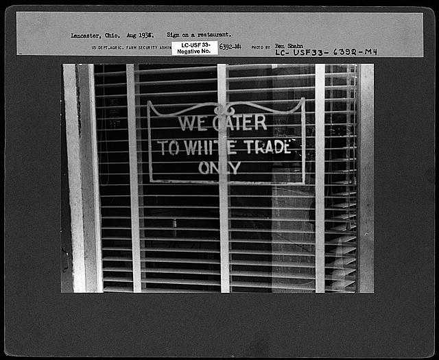 Sign on restaurant indicating "We Cater to White Trade Only," Lancaster, Ohio, 1938.