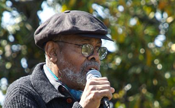 Amiri Baraka addressing the Malcom X Festival in San Antonio Park, Oakland, California.